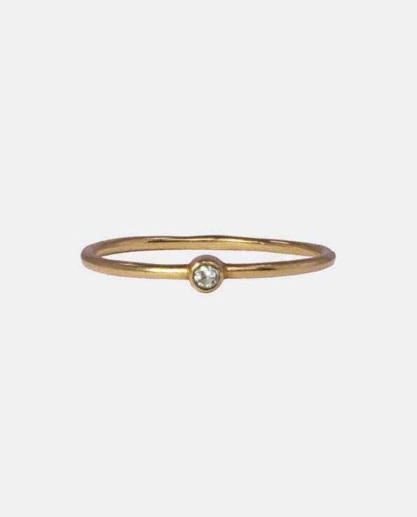 Gilded vintage ring with zircon and charming bumps that lead thoughts back to the royal tombs of history