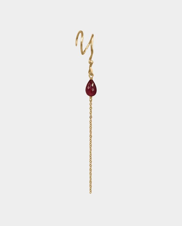 Handmade gold earrings in 18 carat gold with twists like an artistic sculpture with gold threads and rubies for sale in store in Copenhagen
