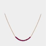 Ann Brunton - gold necklace with small rubies