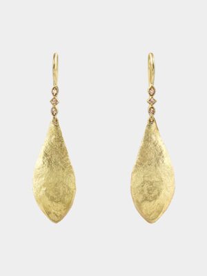 leaf shaped hammerede earrings and white topaz