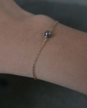 gold bracelet with diamond close up