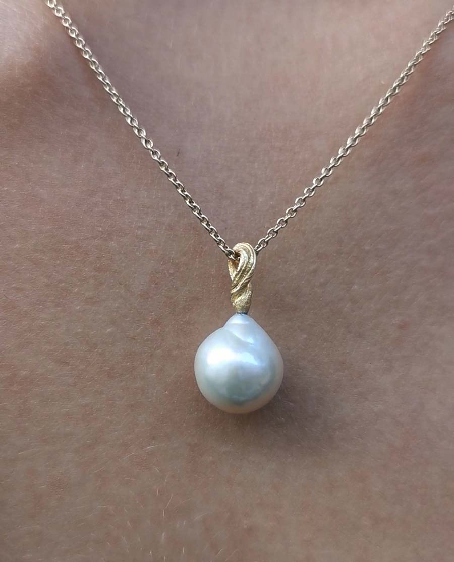 necklace with freshwater pearl and twisted bail model close up
