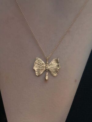 necklace with butterfly model close up