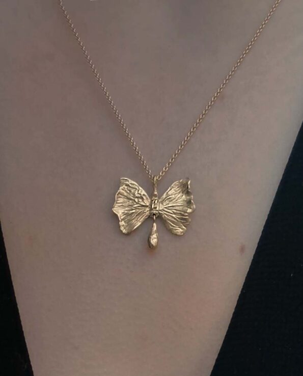 necklace with butterfly model close up