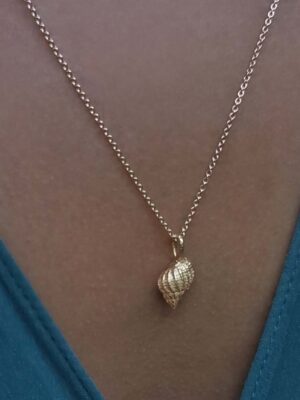 necklace with seasnail model close up