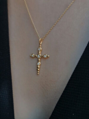 cross with five white topaz model close up