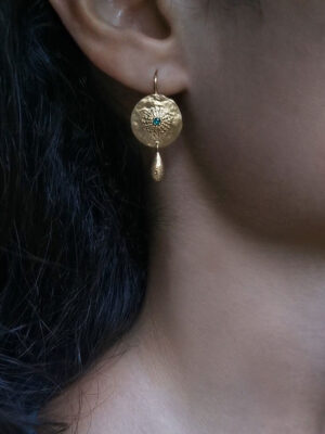 earring with massive drop model close up
