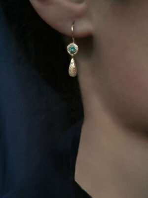 earring with green onyx model close up