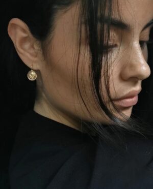 sundial snail earring with white topaz model