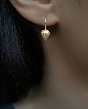 earring with japanese lantern close up