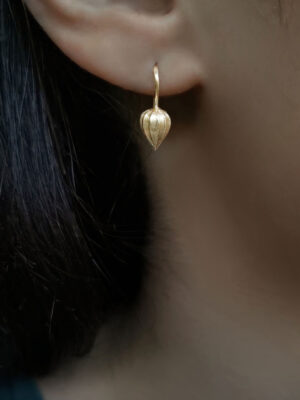 earring with japanese lantern close up