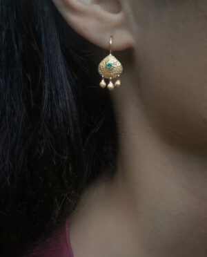 earring with massive drops close up