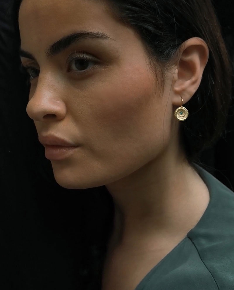 earrings shaped as sea snails