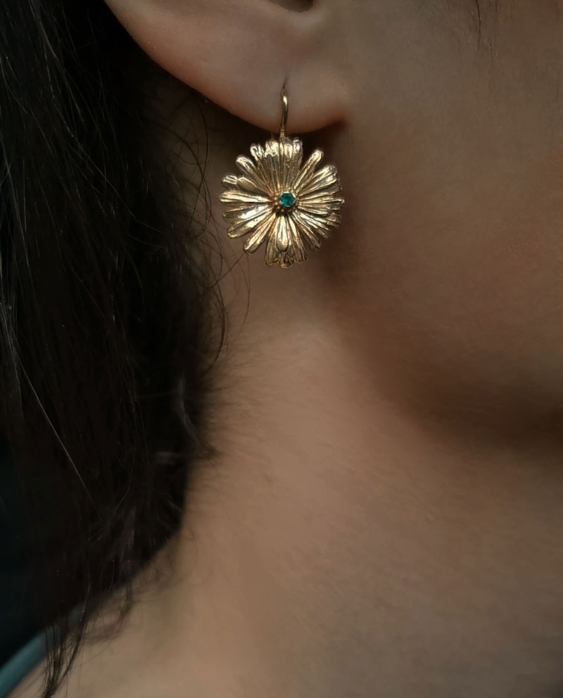 flower earring with seagreen onyx close up
