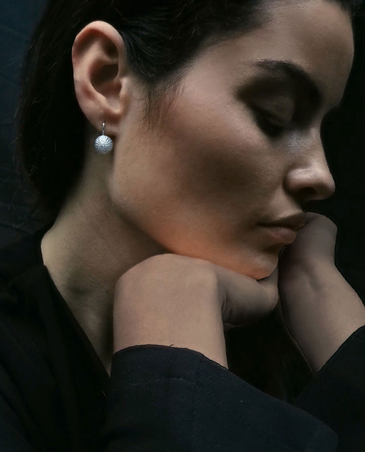 silver turtle sea urchin with white topaz