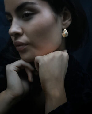 alina skallesnegl med lyseblå apatit