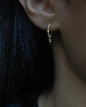 hoops with whirte topaz drop