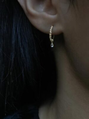 hoops with whirte topaz drop