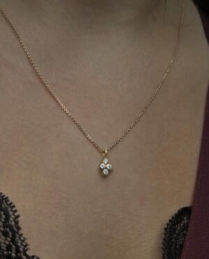 necklace with four white apatite close up