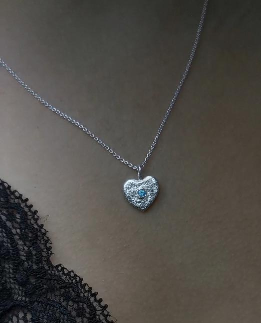 silverheart with light blue apatite close up