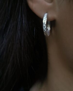 small silverhoops with dots close up