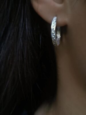 small silverhoops with dots close up