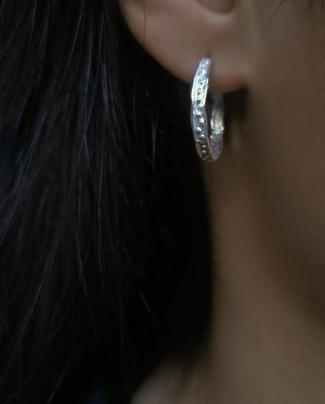 small silverhoops with dots close up