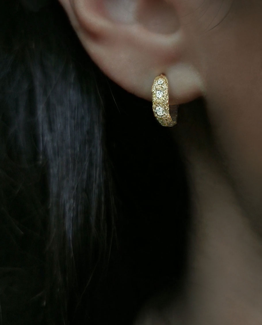 hoops with three topaz close up model