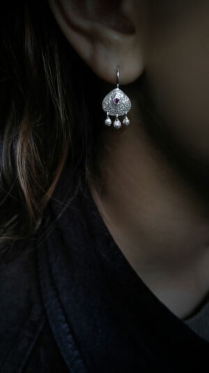 silver earring with three massive drops