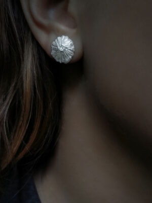 silver shell earring close up
