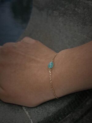 gold bracelet with chrysoprase close up