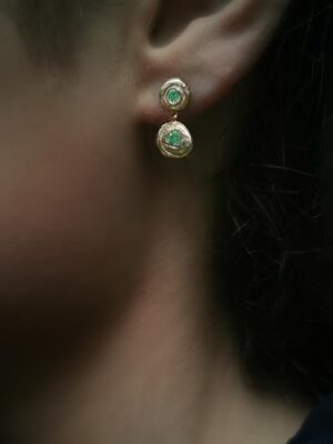 milana with emerald close up